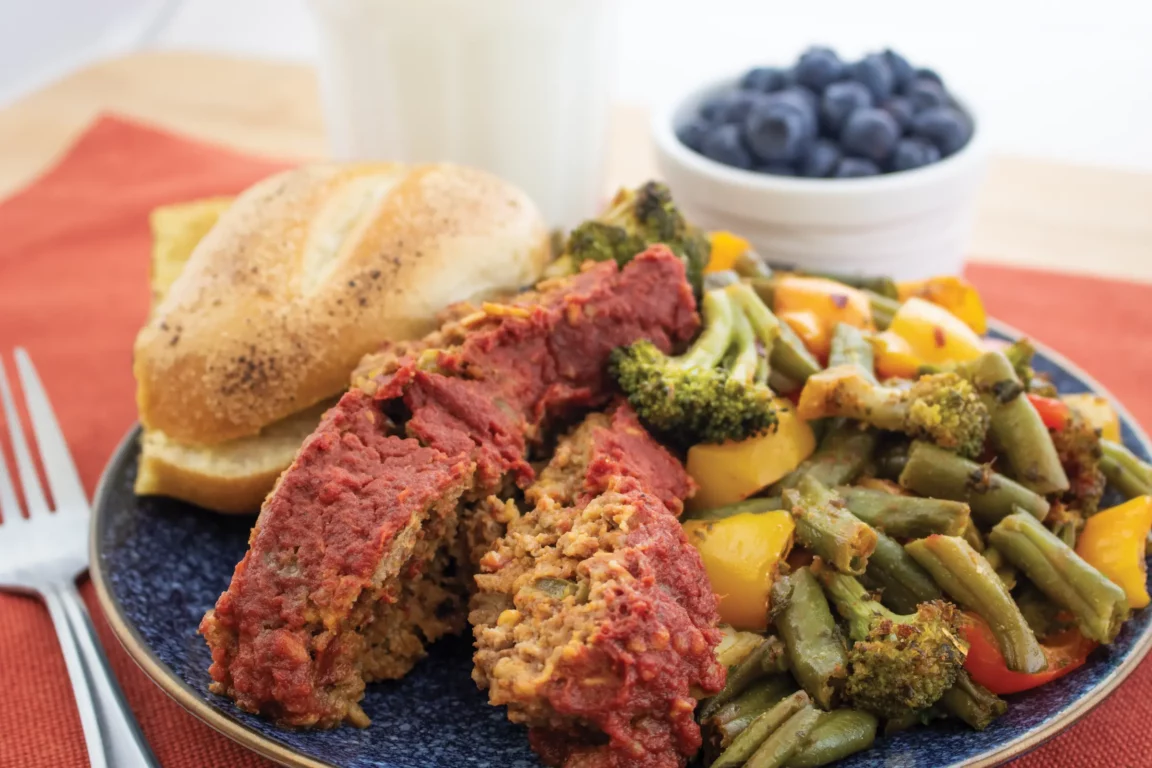 chipotle meatloaf plated with vegetables 